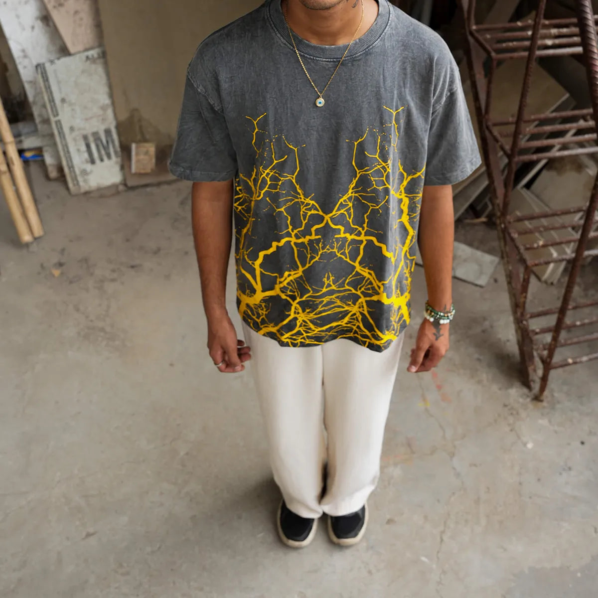 Side profile of Soethical oversized tee showing relaxed streetwear fit and drape